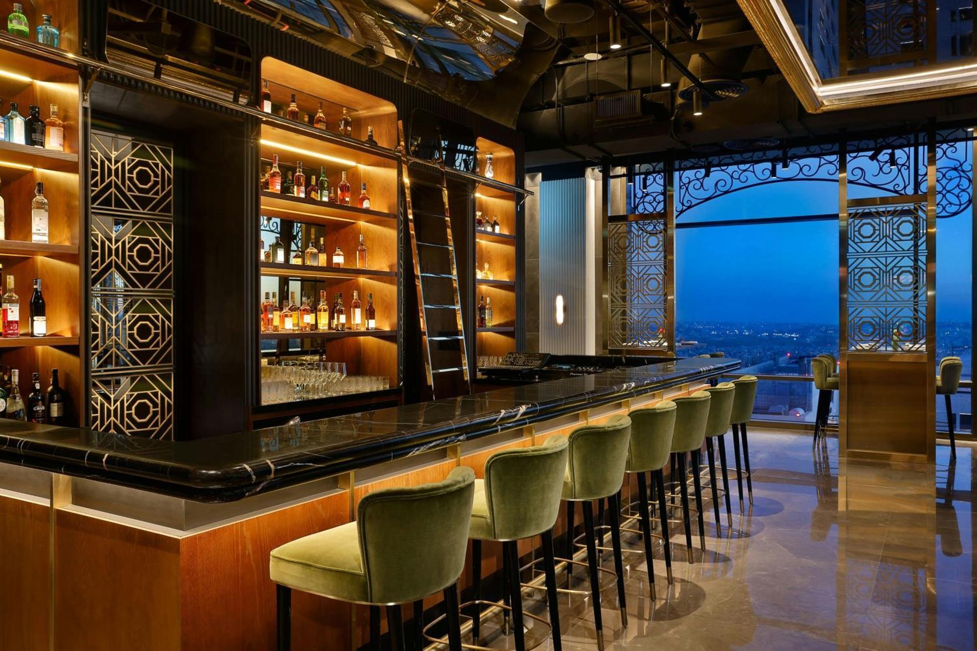 The Ritz-Carlton, Amman Hotel Exterior photo The bar at the 101 lounge