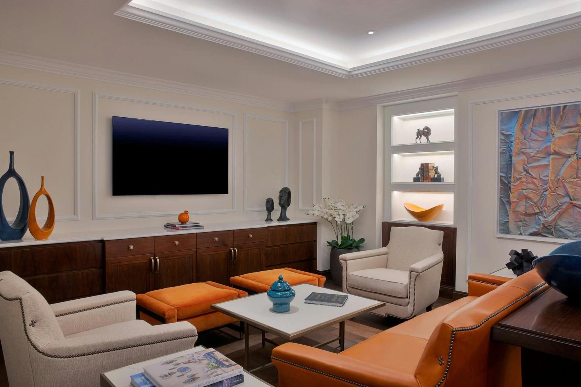 The Ritz-Carlton, Amman Hotel Exterior photo A living room with indirect lighting