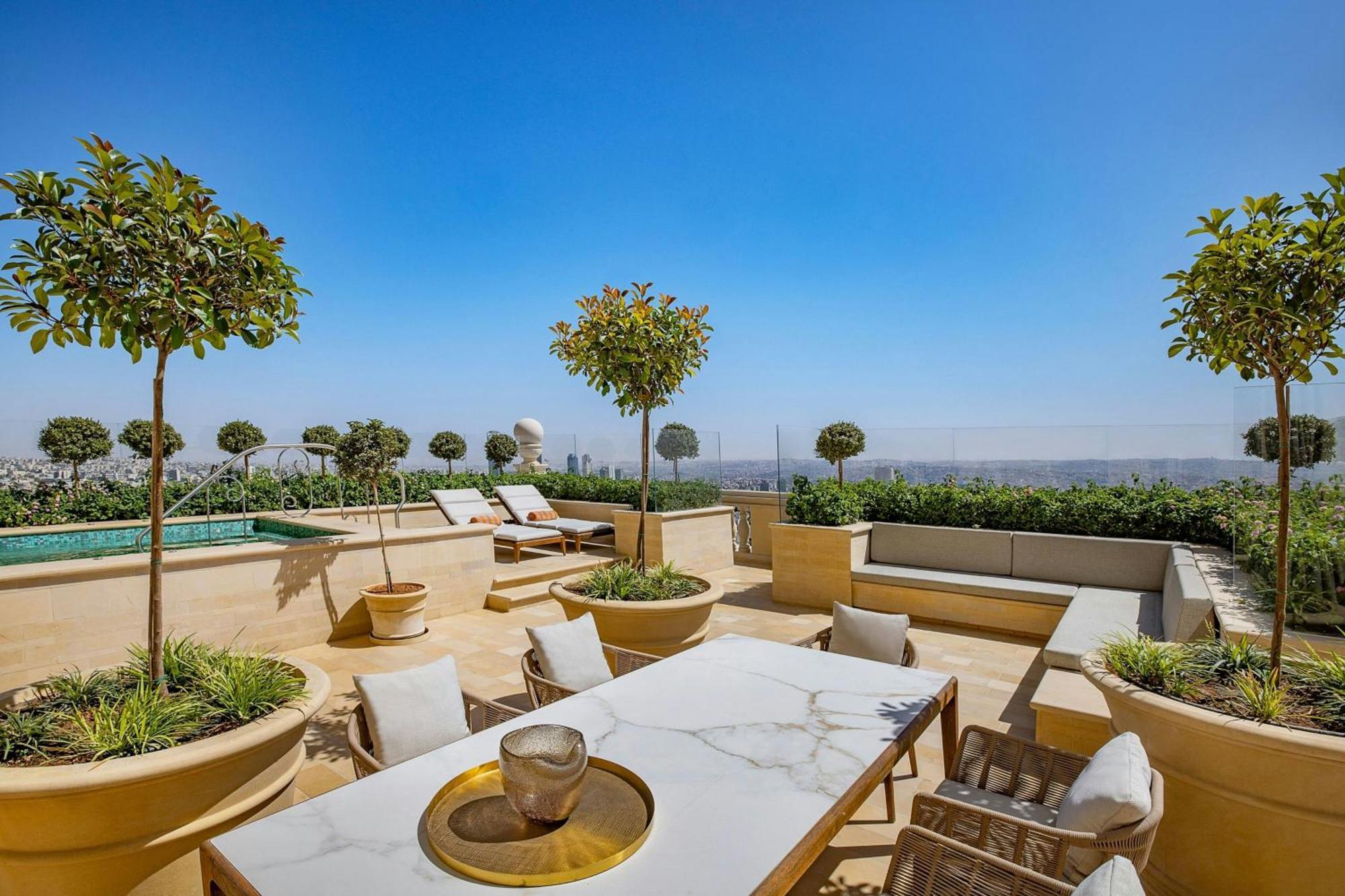 The Ritz-Carlton, Amman Hotel Exterior photo The rooftop pool at the Four Seasons Hotel